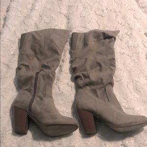 Boots of tan /grey color . Brown heel